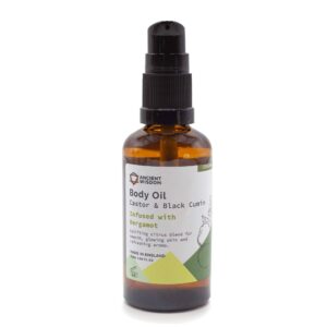Bergamot body oil in a brown bottle with a black pump.